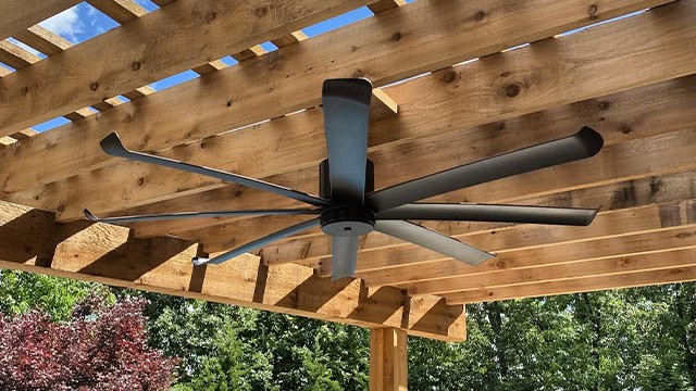 Outdoor Ceiling Fan Installed On Wooden Pergola