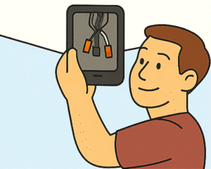 Man taking a picture of light fixture wiring