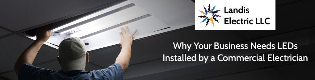 electrician installing led lights in ceiling